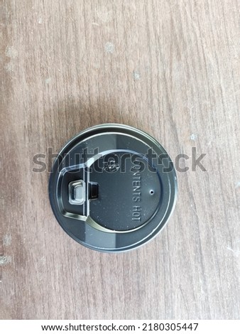 Disposable coffee cup lid, plastic material