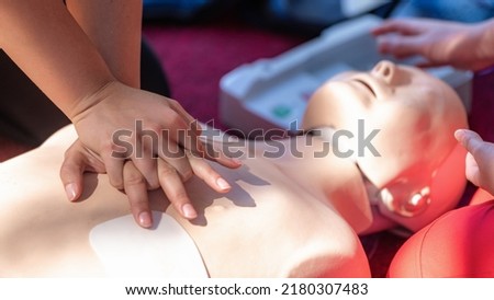 Cardiopulmonary Resuscitation, First Aid Training on a CPR Dummy. Royalty-Free Stock Photo #2180307483