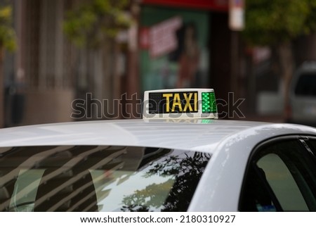 Close up picture of a taxi sign