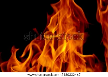 Abstract blur of Fire flames on black background. Burning power. Flames from hell.
