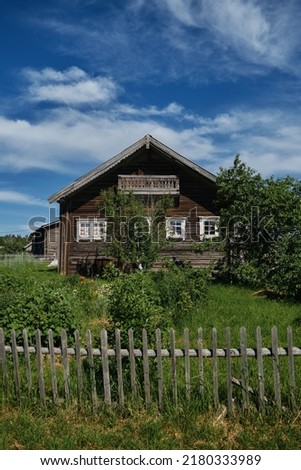 The concept of travel in Russia. One of the most beautiful villages of Karelia Kinerma in summer. The old wooden house has been well preserved to our time.