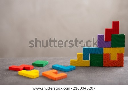Creative idea solution - business concept, jigsaw puzzle close up. Leadership and teamwork strategy success. Royalty-Free Stock Photo #2180345207