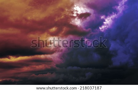 Colorful clouds and sun on the sky. Color toned image. 