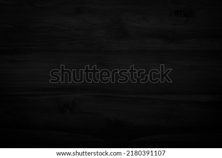 Black vintage painted wooden boards wall antique old style background. Grunge dark old wood texture and seamless for furniture design. Painted weathered peeling table wood hardwood decoration.