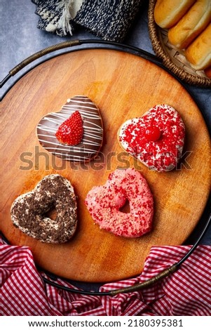 Doughnuts with colorful sprinkles isolated on white background top view
