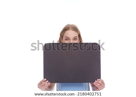 Very happy excited, businesswoman showing blank banner signboard. Success and advertising concept. Copy space empty place for some advertisement ad text. Woman girl at studio.