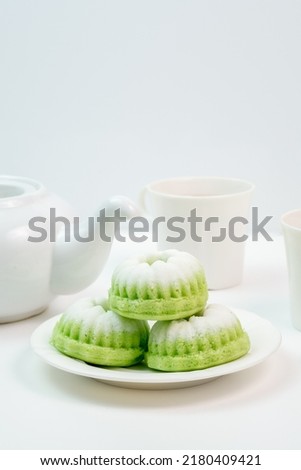Putu Ayu cake or Putri Ayu cake is one of the traditional Indonesian snacks or snacks made by steaming. white background Royalty-Free Stock Photo #2180409421