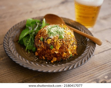 Fried rice with curry and beer