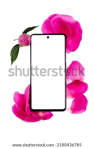 The phone is in pink flowers and peony petals on a white background. Mock-up