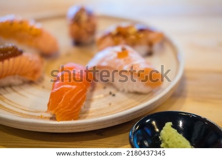 Fresh of salmon sushi. Selective focus and close up.