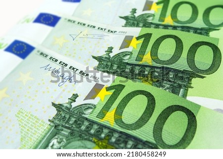 300 Euro banknotes against white background close up Royalty-Free Stock Photo #2180458249