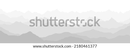 Black and white mountain landscape, ridges in the fog, panoramic view Royalty-Free Stock Photo #2180461377