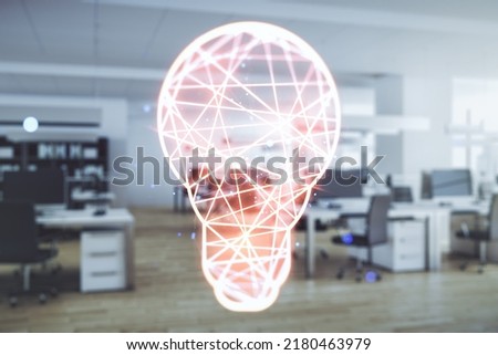 Double exposure of creative light bulb hologram on modern corporate office background, research and development concept