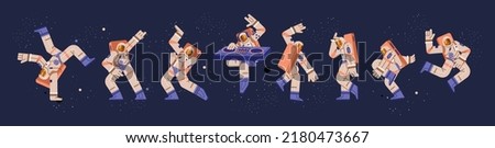 Astronauts dance and play music on DJ mixing console in flat vector illustration. Set of different dancing spacemen in spacesuits isolated on space background. Disco, electro music party Royalty-Free Stock Photo #2180473667