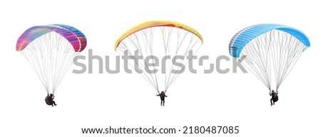 collection Bright colorful parachute on white background, isolated. Concept of extreme sport, taking adventure challenge. Royalty-Free Stock Photo #2180487085