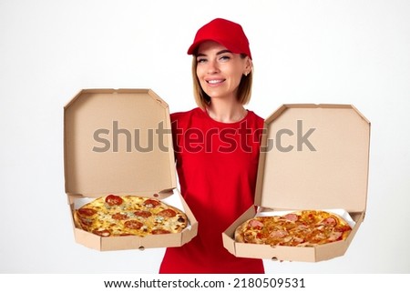pizza delivery girl showing pizza inside boxes