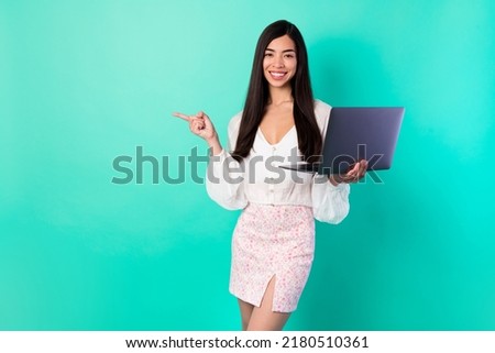 Photo of lady point empty space digital network offer use netbook wear white skirt suit isolated cyan color background