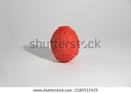 An Isolated red easter egg
