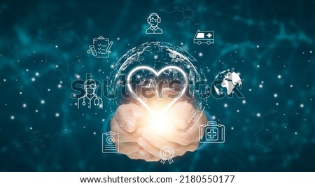 Businessman holding heart with Medical icon and connection, give love sincerely, dating application to find love online,Healthcare And Medicine concept, medicine and people, medical business