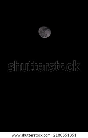 small moon in the black night background for quote concept