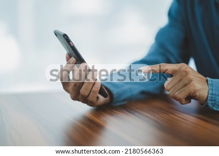 Man using smartphone search on internet mobile 