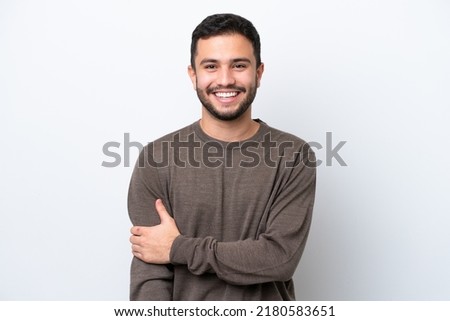 Young Brazilian man isolated on white background laughing Royalty-Free Stock Photo #2180583651