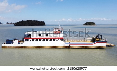 The Captaincy of the Ports of Maranhão authorized the transfer of the José Humberto ferry, this Tuesday between the municipalities of Alcântara and São Luís Royalty-Free Stock Photo #2180628977