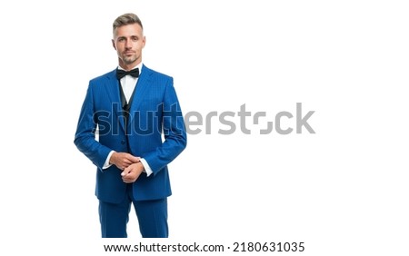 mature man in bow tie blue suit. businessman isolated on white. formal wear concept. copy space Royalty-Free Stock Photo #2180631035