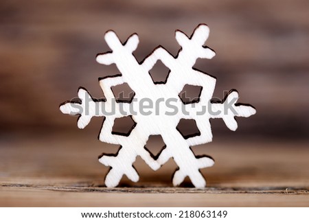 A Snowflake on Wood, Single Snowflake, Wooden Christmas or Winter Background