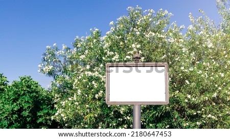 Blank square sign mockup in the urban environment on the street, empty space to display your store sign or logo. Mock-up on white background for the design of advertisements.