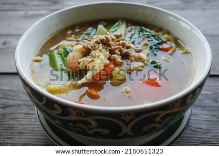 noodle soup on a wooden table