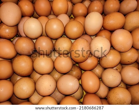 eggs that are marketed in a super market, are like foodstuffs that are in great demand by people.