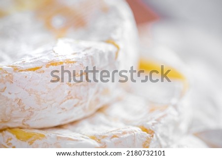 Camembert close-up. Macro photography of cheese for the cover. Camembert advertisement. Cheese for the cover. Brie advertisement. Brie close-up. Cheese with mold close-up. Camembert briquettes. Cheese