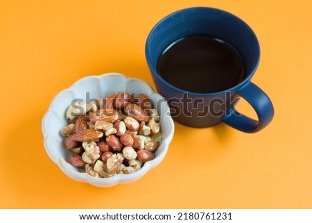Pictures of nuts and coffee and orange background