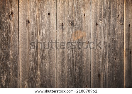 Old dark brown wooden wall, background photo texture