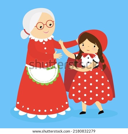 grandmother and granddaughter in a red cap