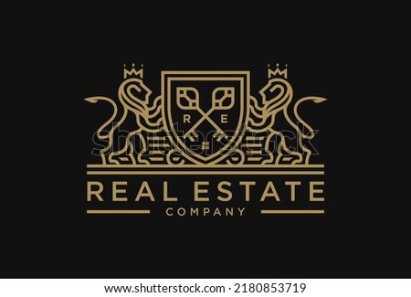 Luxury Lion key real estate logo. Elegant heraldic shield crest icon. Vintage royal heraldry brand identity emblem. Vector illustration. Royalty-Free Stock Photo #2180853719