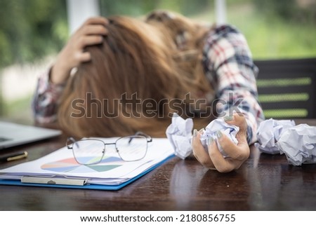 Concept Burnout Syndrome. Woman feels uncomfortable working. Which is caused by stress, accumulated from unsuccessful work, failure to work, Consult a specialist psychiatrist. Royalty-Free Stock Photo #2180856755