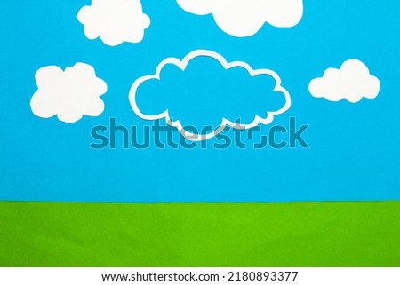 blue sky with cloud as copy space, more clouds around, the sky is and meadow, clean air, blue sky, creative design