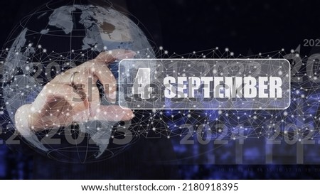 September 4th. Day 4 of month, Calendar date. Hand hold virtual screen card with calendar date.  Autumn month, day of the year concept
