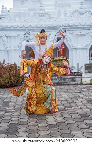 beautiful dress with poses for music, dance, performances, Burmese arts, wearing masks
