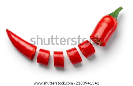 Chili pepper isolated. Cut chilli top view on white background. One red hot chili pepper top. Round slices. With clipping path. Royalty-Free Stock Photo #2180941541