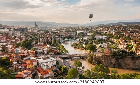 The urban landscape of Tbilisi in the daytime. Bird's-eye view Royalty-Free Stock Photo #2180949607