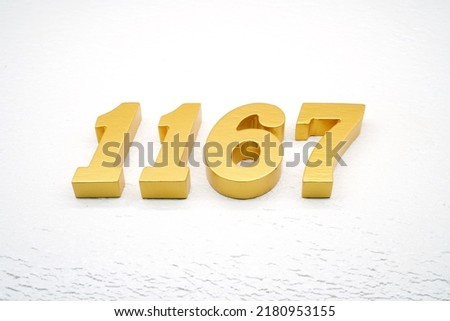    Number 1167 is made of gold painted teak, 1 cm thick, laid on a white painted aerated brick floor, visualized in 3D.                                 