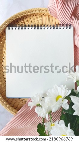 Mockup for a postcard with flowers, straw, powdered cloth and marble. Mockup for presentations, flatlay, etc