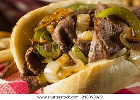 Homemade Philly Cheesesteak Sandwich with Onions and Peppers Royalty-Free Stock Photo #218098069