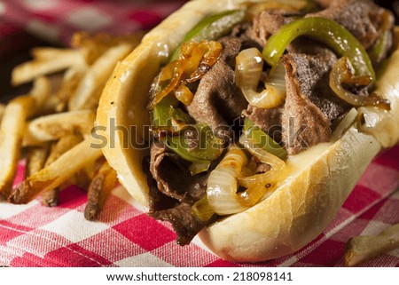 Homemade Philly Cheesesteak Sandwich with Onions and Peppers Royalty-Free Stock Photo #218098141