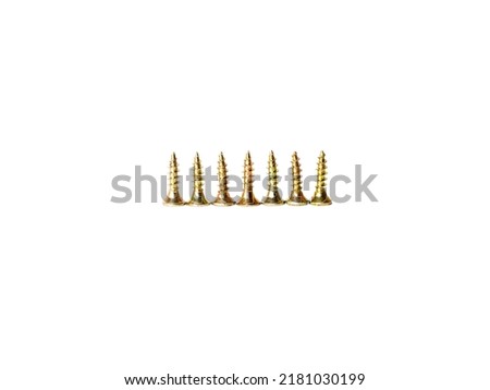 Bunch of yellow zinc coated steel screws isolated on white background. Fasteners.