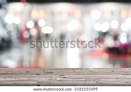 Empty table top with bokeh lights abstract blur expo. For product display and presentation.