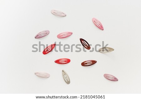 Hair clips on a white background. Colored invisible hair.